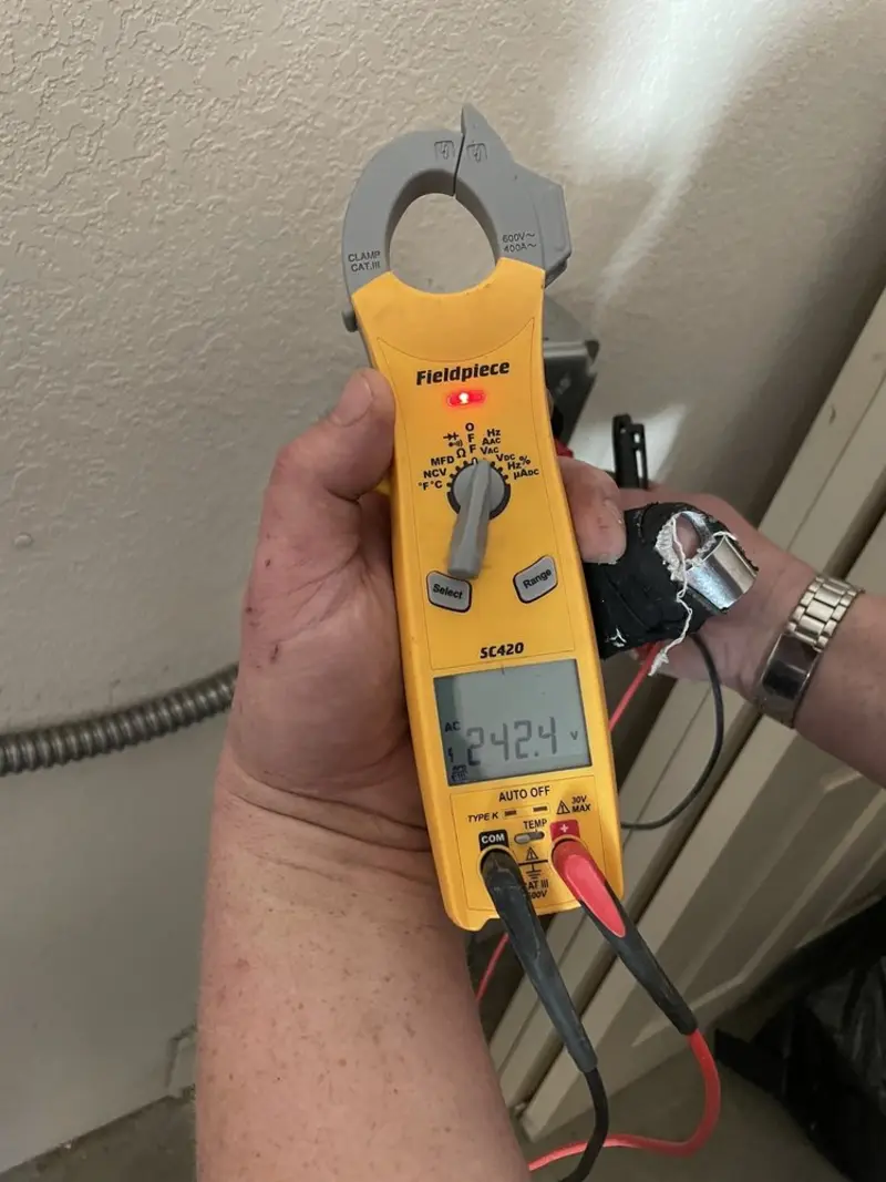 Voltage testing with clamp meter during Generator Installation in White House